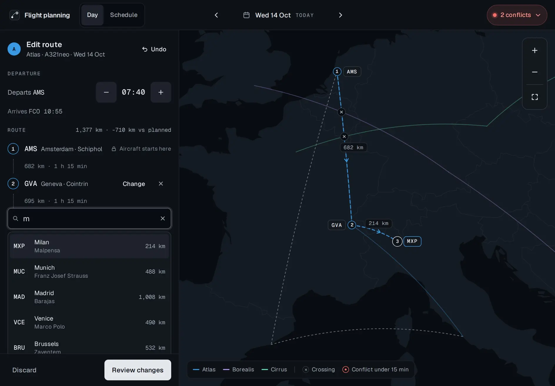 The route editor on a tablet with m typed in the airport search. Milan Malpensa, 214 km, is highlighted, and the map previews it as stop 3, dashed, after Geneva.