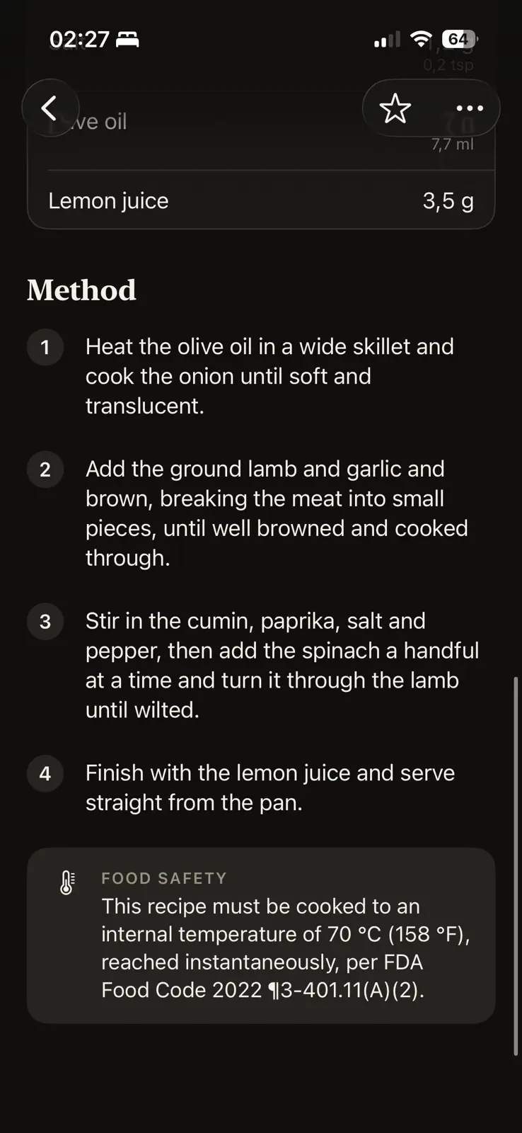 The lower half of a lamb and spinach recipe, in dark mode. Four numbered method steps, from softening the onion in olive oil to finishing with lemon juice. Under them a food safety card says the recipe must be cooked to an internal temperature of 70 °C, or 158 °F, reached instantaneously, per FDA Food Code 2022, section 3-401.11(A)(2).