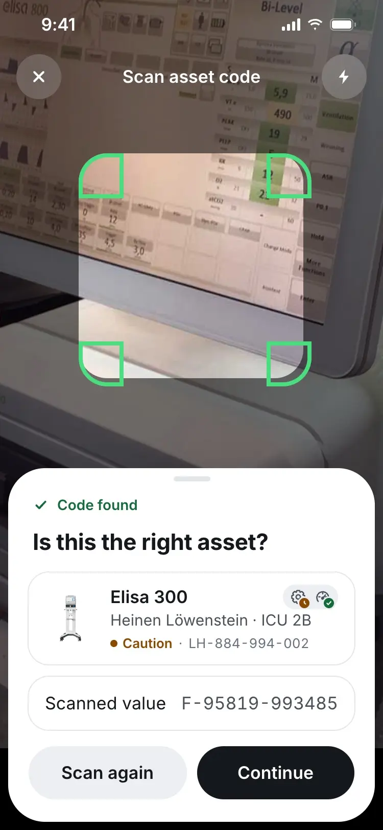 A sheet confirming the scanned code matched the Elisa 300, asking if it's the right asset.