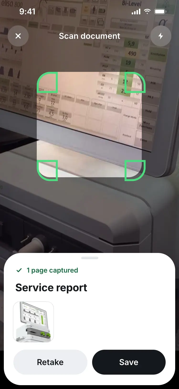 A captured document page shown as a service report thumbnail, with options to retake or save.