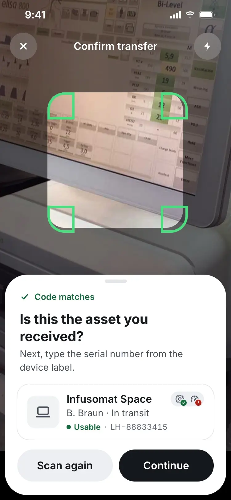 Scanner with a green frame reading "Code matches", asking if this is the asset received.