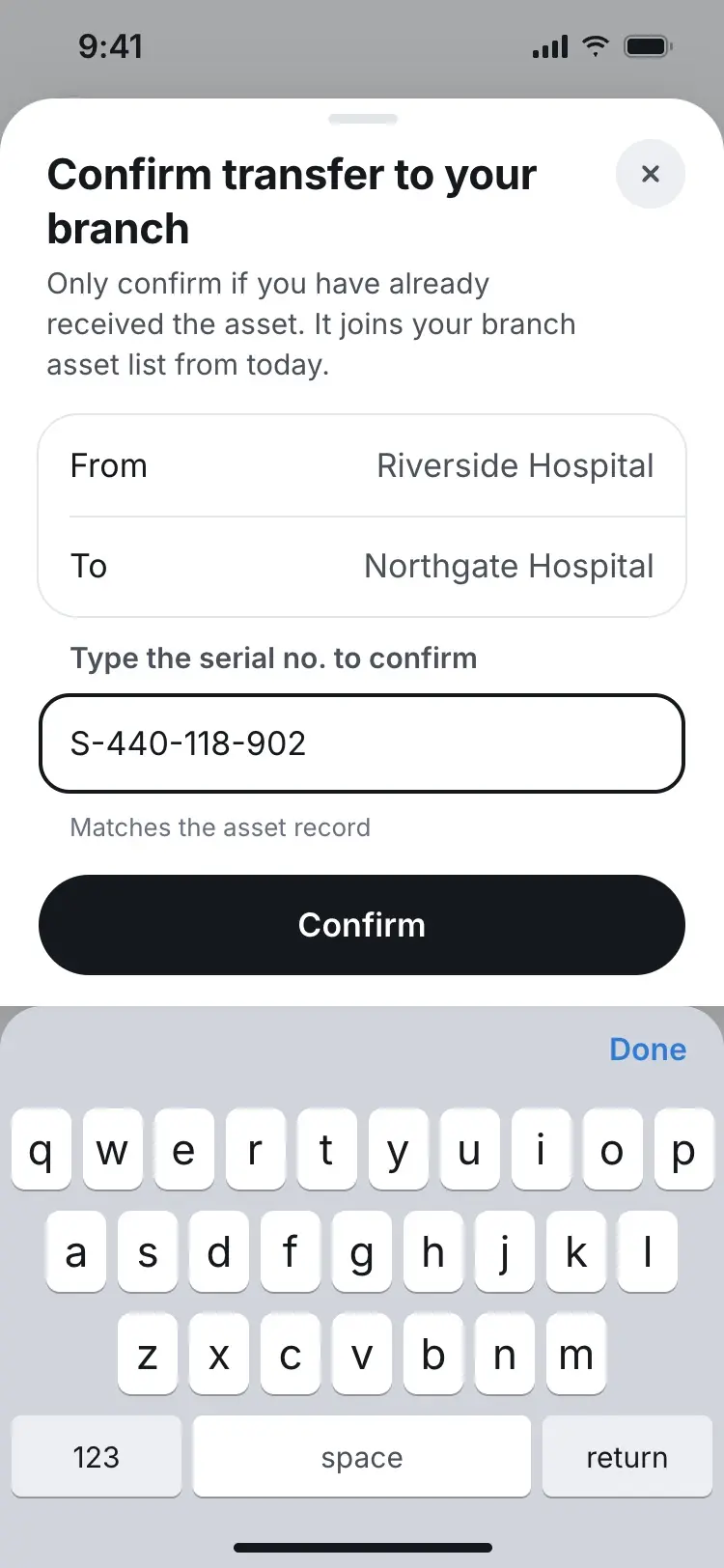 Confirm sheet with the serial number typed in and "Matches the asset record" shown.