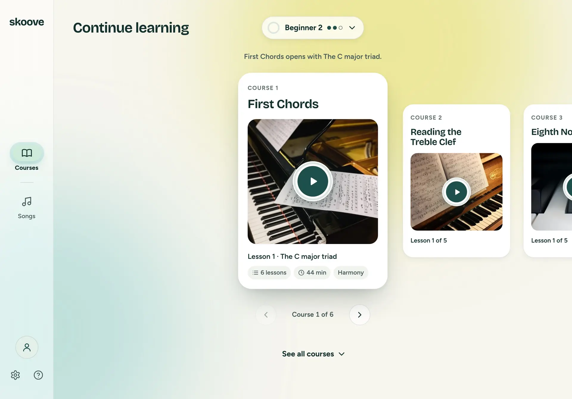 Continue learning after switching to Beginner 2. The pill reads Beginner 2 with an empty ring. Course 1, First Chords, is in focus, not started, and the line above reads First Chords opens with The C major triad. Course 1 of 6.