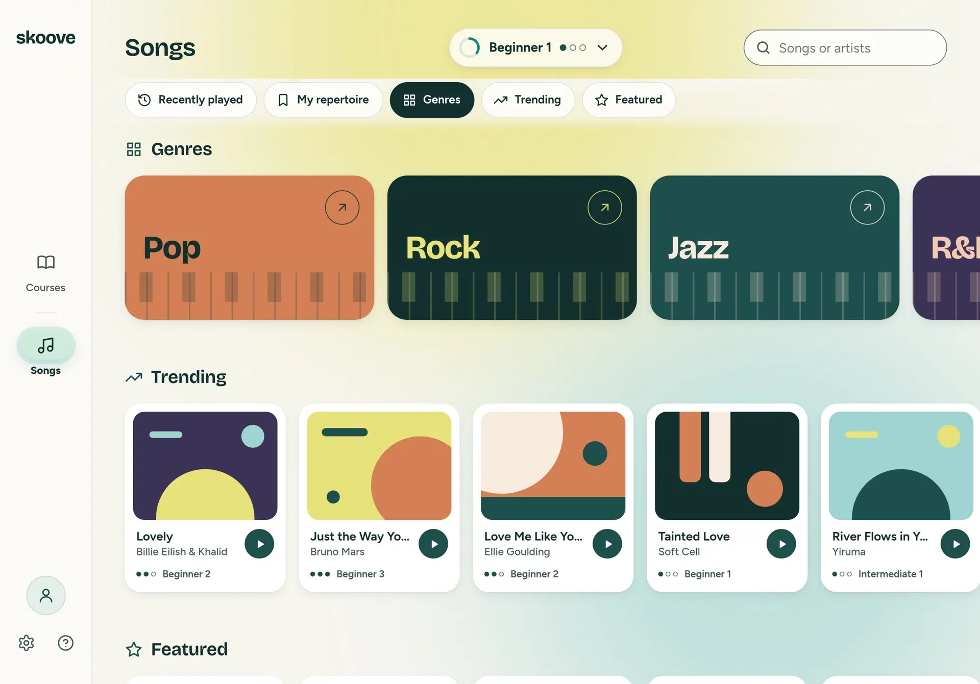 Songs, with the Genres chip selected. A row of large colour cards named Pop, Rock, Jazz and the edge of R&B, each with a strip of piano keys along its foot. Below, Trending, with song cards marked by level, such as Lovely by Billie Eilish & Khalid, Beginner 2.