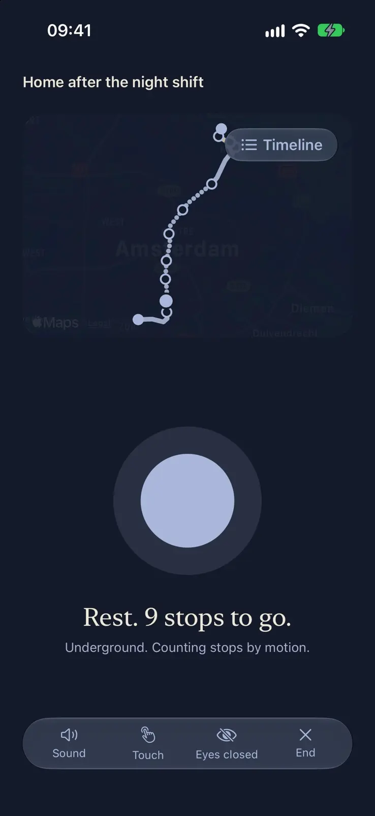 The same moment in dark mode, a pale blue orb in a navy ring, and cream type on deep navy.